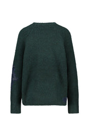 Strickpullover mit Stickereien